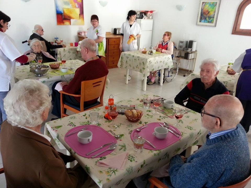 Residents enjoying the meals.